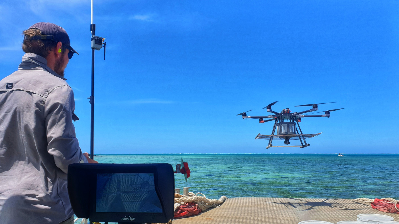 The Envico team lands the drone on the barge in the Pacific while conducting an aerial drone rat eradication project
